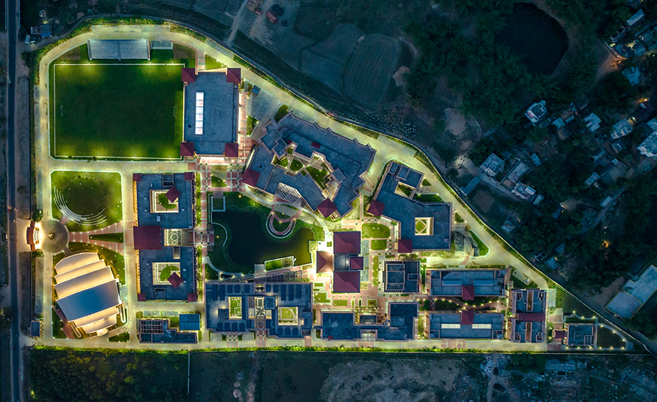 Aerial night view of Biswa Bangla Biswabidyalay campus and sports facilities