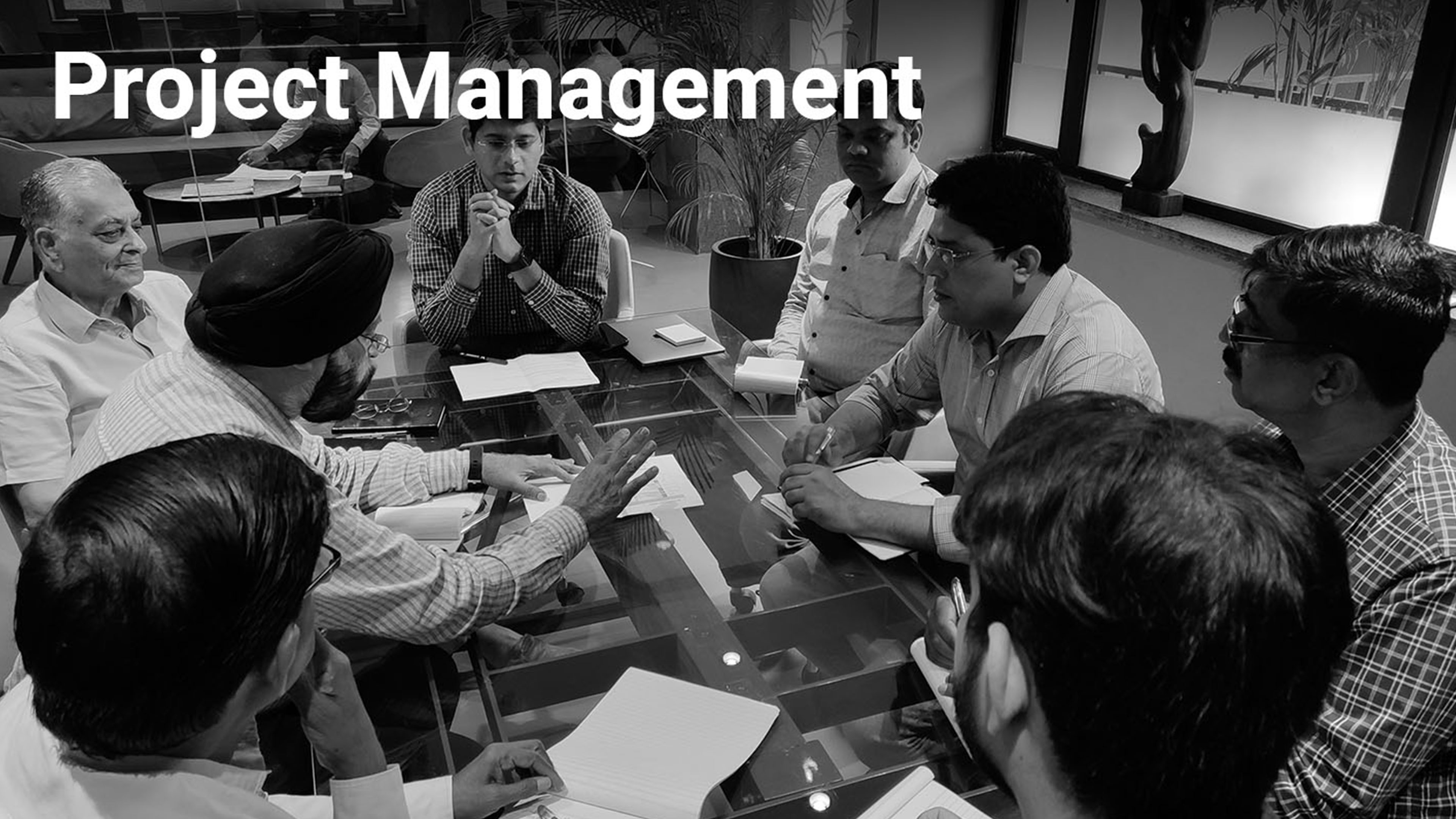 Architects and engineers collaborating on project management and planning for large-scale developments